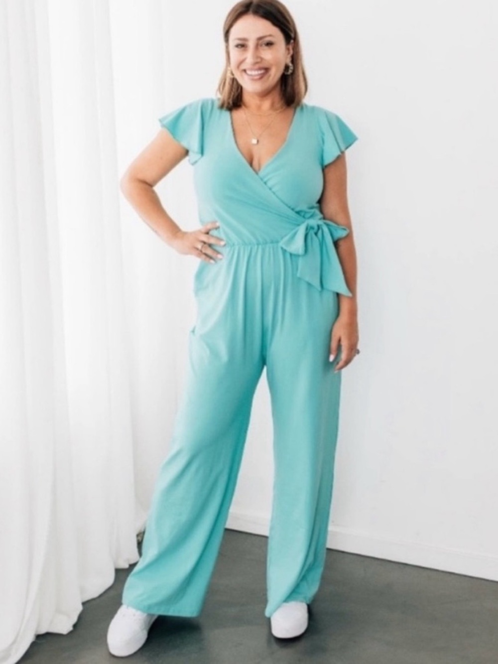 Smash + Tess blue jumpsuit with a wrap-style top and a tie waist XS EUC